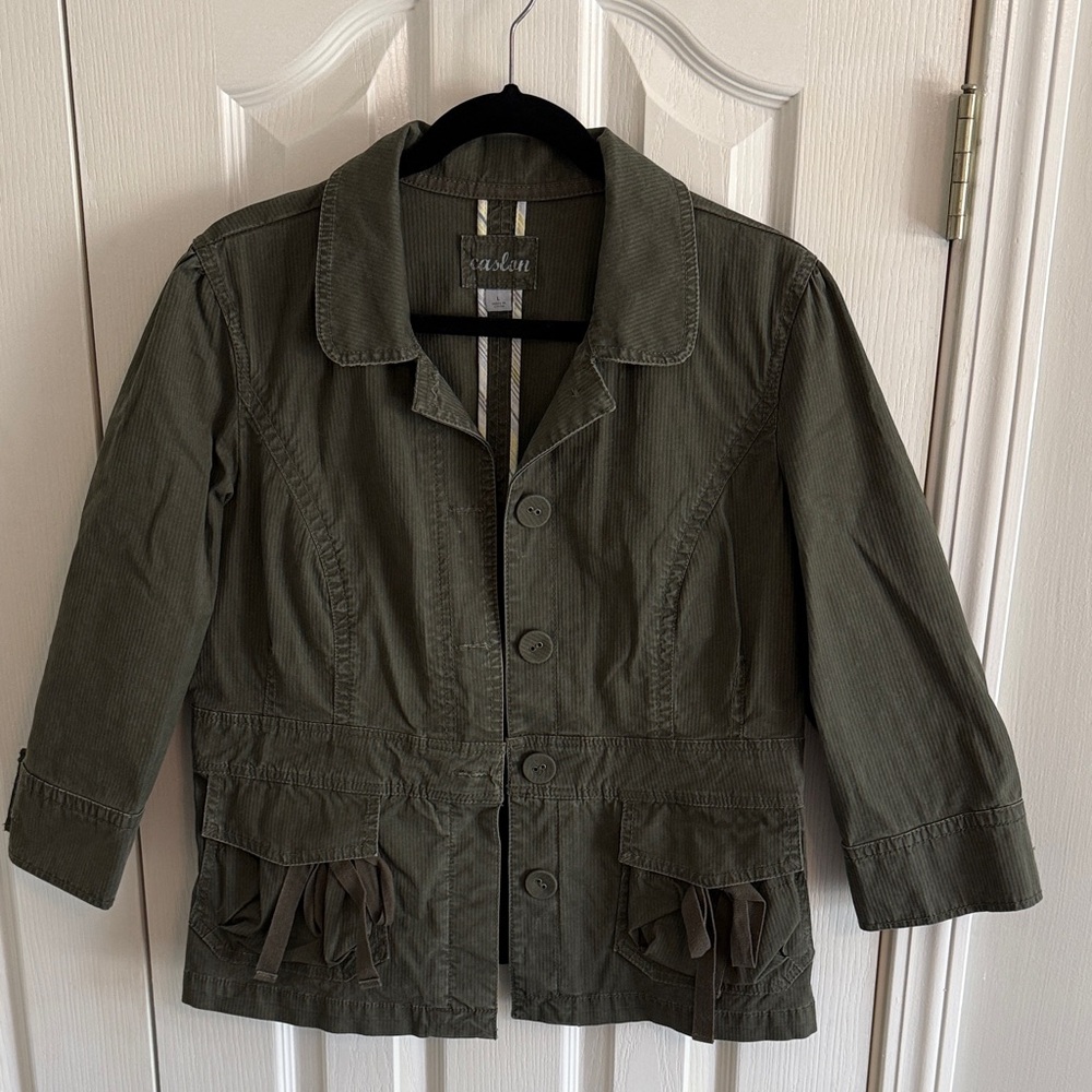 Olive green fitted jacket with cropped sleeves.